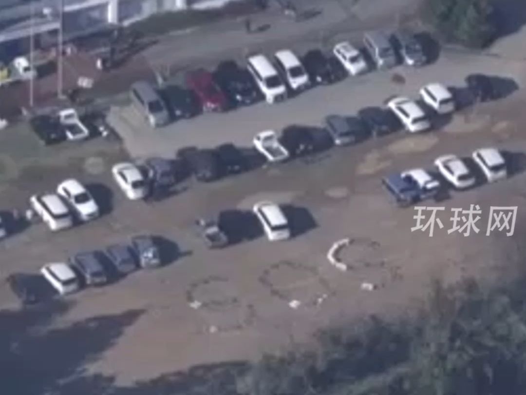 能登半岛地震已致30人死亡，航拍显示大学停车场上出现“SOS”字样