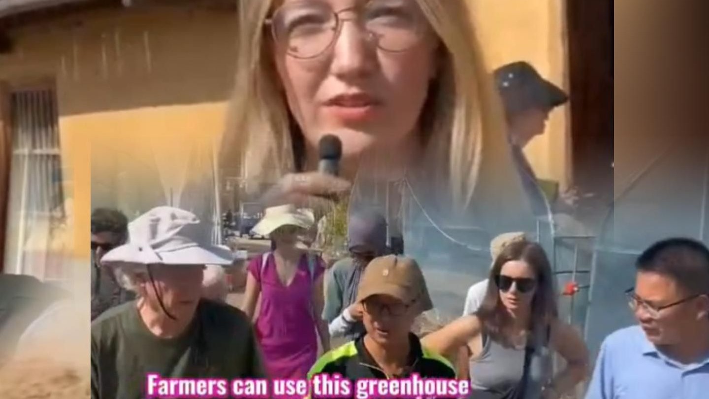 “投资于人民而不是战争 才能摆脱贫困”美国妇女反战组织参观中国华屋村