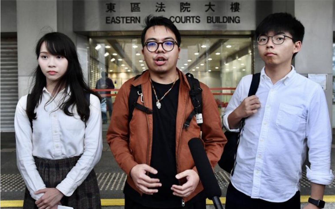 黄之锋周庭涉非法集结案被判刑 市民痛斥“汉奸”祸港